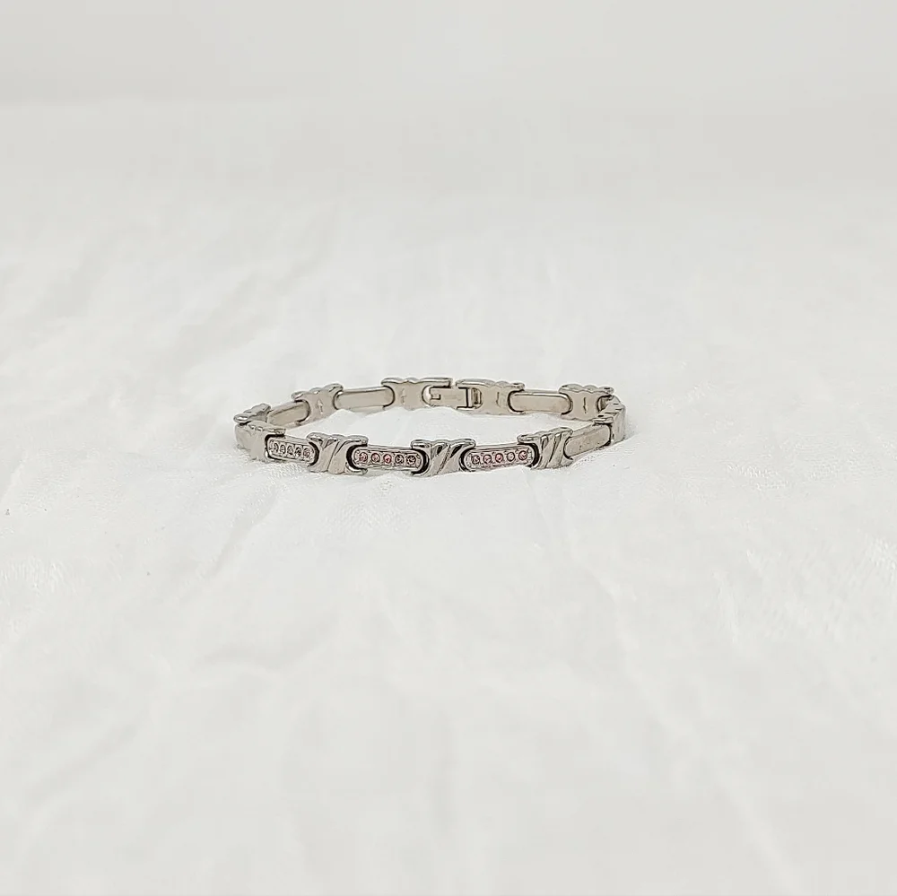 Silver bracelet with tiny pink crystals